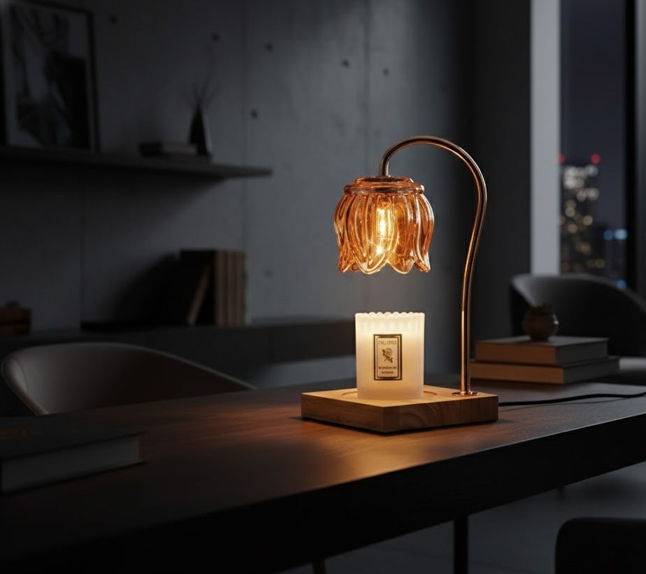 Decorative table lamp candle warmer with a warm glow on a wooden surface in a dimly lit room